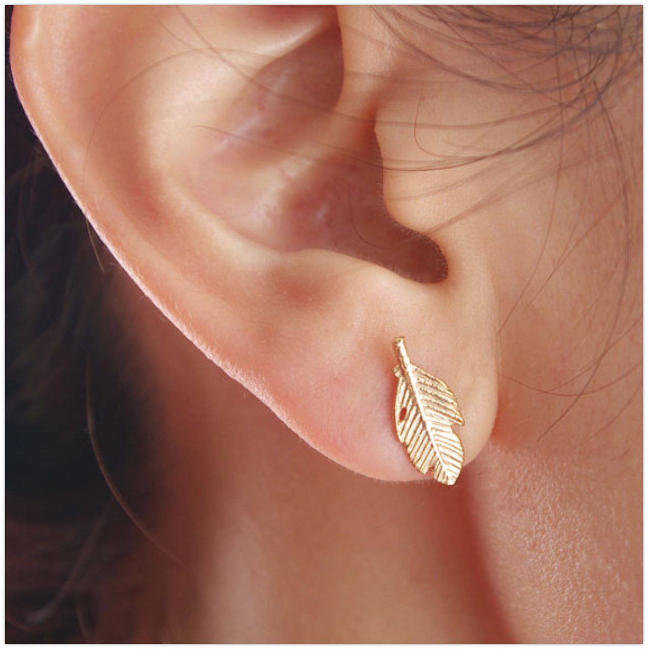 Gold stud earrings hypoallergenic in a leaf shape